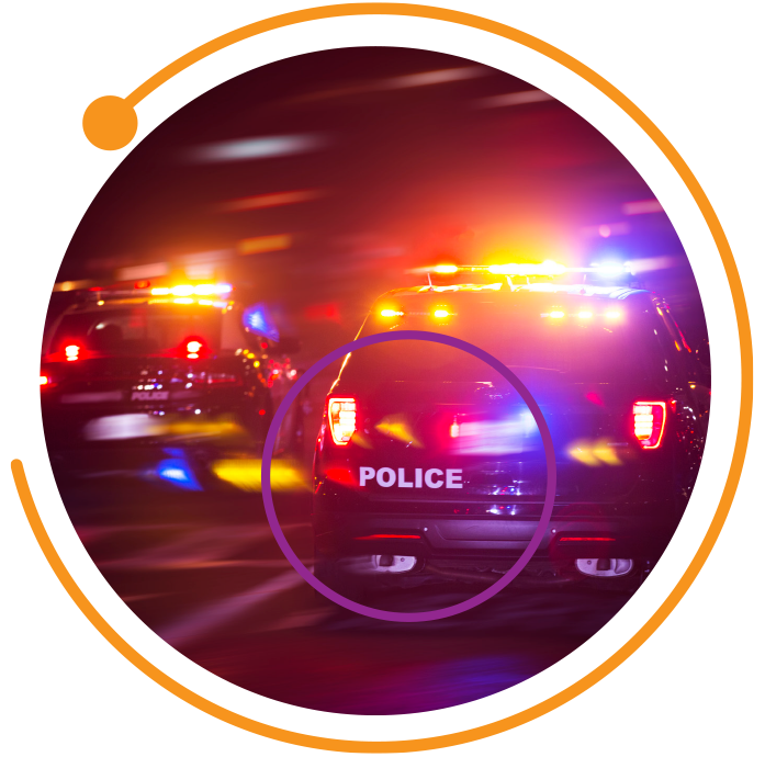 two police cars at night