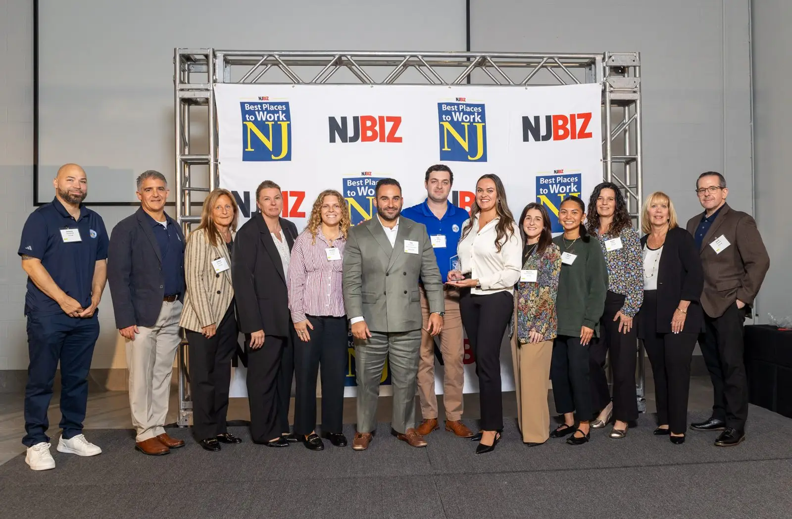 The VCS HR team accepting the 2026 NJBIZ Best Places to Work award in Freehold