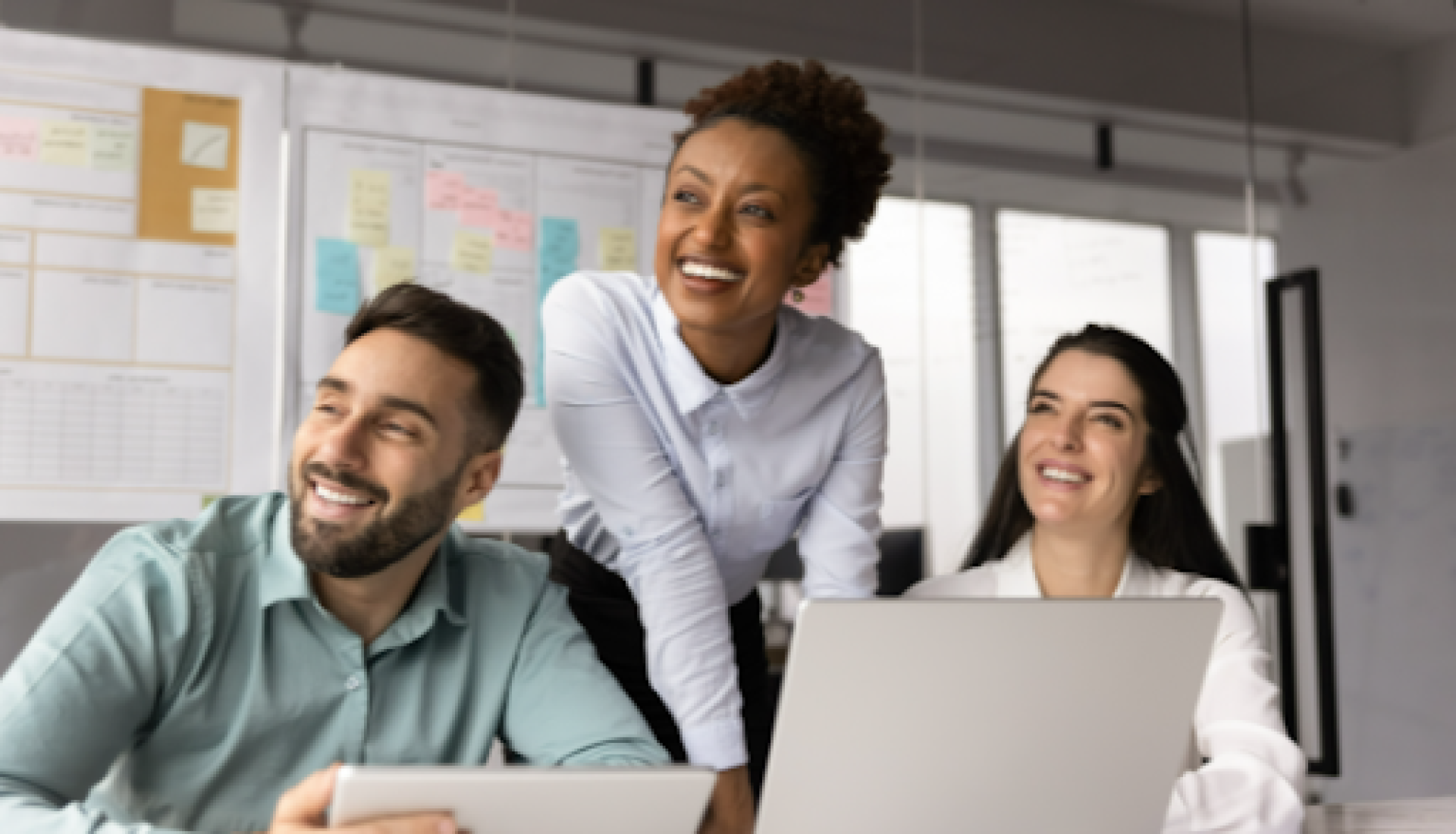 Happy employees working together